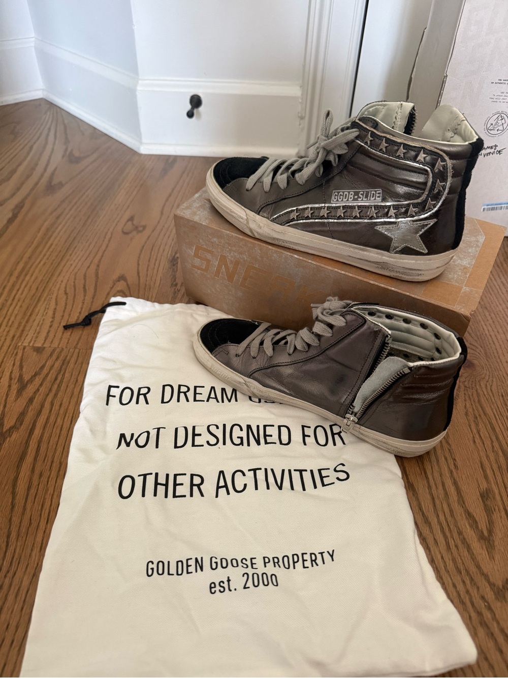 Golden Goose Women’s High-Top Sneakers in Silver and Black